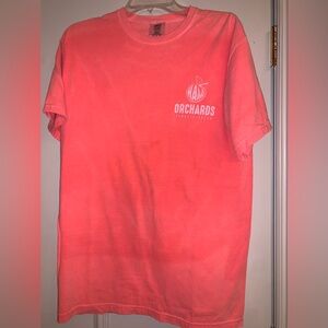 Watermelon colored Ham Orchards graphic T-shirt. Size: M